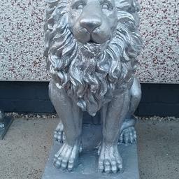 Large lion garden ornament. used but in vgc. SOLD has seen. Made out of resin and fibre glass I think. it's heavy but not has much has concrete