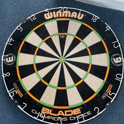 Blade champions choice dart board good condition little wear on the 20 which can be sorted by rotating the board collection only