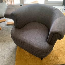 Very good condition barrel comfy dark grey upholstered chair with black wood legs collection or can deliver locally £10 quick sale