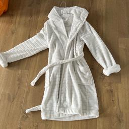 Age 11-12 dressing gown from next 
Barely worn so in excellent condition 
Lovely & thick 
Pick up Wingate