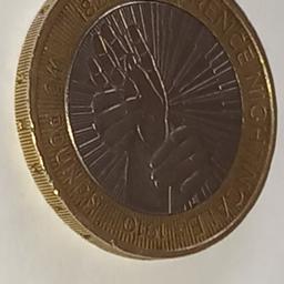 2 pound coin with a printed error,have a look a picture to see