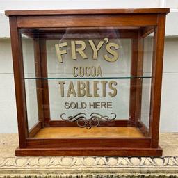 Vintage sweet shop display unit

Made of solid wood and glass, with single glass shelf inside and sliding rear panel

“Fry’s cocoa tablets sold here” artwork added later in gold and black

Lovely condition

H: 42cm W: 45cm D: 28cm