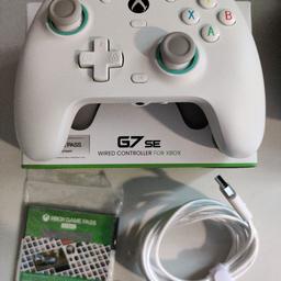 mint as new no smells ive barely held it. less than 2 months old, 0 deadzone best controller ive ever used, 2 paddles on the back. only selling because ive lost interest in games, comes with a month of xbox live ultimate worth £13