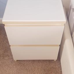 Pair of White Malm IKEA bed side tables in good condition. Glass on the top to protect the table included.