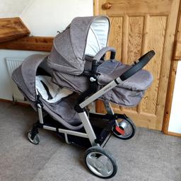 Mothercare Genie Double

can convert from crib to seat

Comes with
2 seats
2 raincovers
Carseat adaptors
Makes a rhythmic clicking noise when pushed
From a Smoke and Pet Free Home