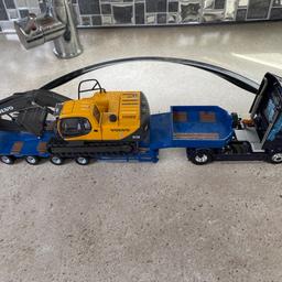 Corgi Cole’s and son lorry with a Tekno low loader trailer and Volvo digger trailer extends no mirrors on  lorry never been played with been on display in cabinet no boxes cash on collection open to reasonable offers