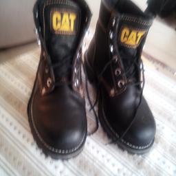 ladies work boots. CAT. size 7. black ,lace up with steel toecaps. worn once. wrong size bought.