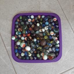 Marbles. As seen in tupperware lid. Collection DY8