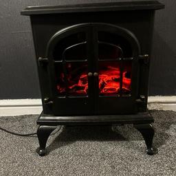 Electric fire , self standing bit dusty not used 
Electric heater and flame light