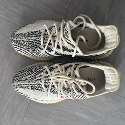 Fairly used adidas yeezy, purchased 1 year ago. Still got plenty of wear in them. Needs a clean but other than that no defects.