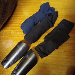 Small north deer shin pads with holders.  Comes with 2 pairs of football socks