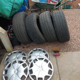 215/65 15inch tyres, steel rims, Ford wheel trims off transit custom with wheel nuts £200 no offers please, used condion plenty tread, collection near Russells Hall Hospital please..