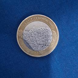 Very rare Charles Dickens 2 pound coin 2012 Royal Mint 3 mistakes . Dispatched with Royal Mail 1st Class Letter. -1 mistake the wording "something will turn up" is upside down-2 mistake dots around the queens face are not complete.-3 misstamping of WILL. (Worn die)