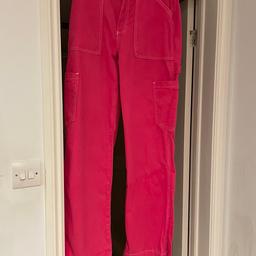 Pink with white stitching cargo jeans. Size 10. 100.% cotton. Excellent condition