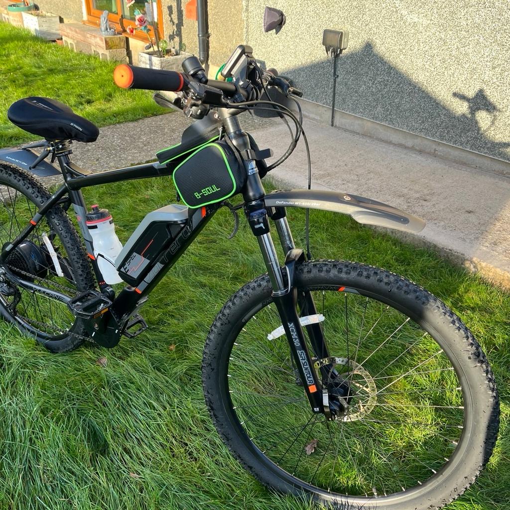 Carrera Vulcan Electric Mountain Bike. 20” Frame. SA Suntour Electrics. 36v Battery/11.6 ah & Charger. (I’ve had 60 Miles on a single charge). 9 Gears. Disc Brakes. Adjustable Front Forks. Aluminium Frame. Water Bottle & Holder. Side Stand. Lights. Crossbar Waterproof Phone Holder with side pockets.