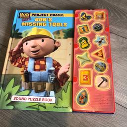 Lovely Bob the builder play a sound story book with musical pieces