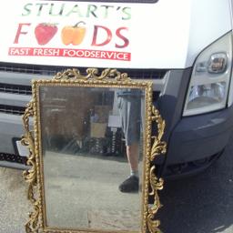 ornate resin mirror
with a bit of damage to surround
£10