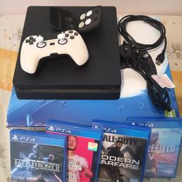 Ps4 slim 500gb + 4 paddle controller and 4 games. In working order. 80ono