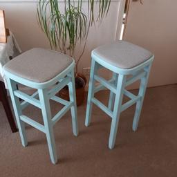 2 upcycled bar stools in a light blue chalk paint and sealed eith Annie Sloan clear wax. re- upholstered tops in stylish grey vinyl.   Very Good condition not been used since upcycle.  Collection only.