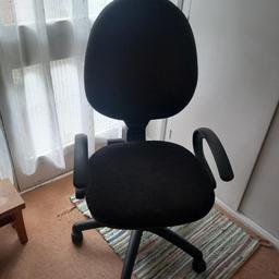 A black wheeled office chair . minimal use in spare bedroom.  collection only