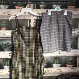 THIS IS FOR A NEVER WORN GREY AND PINK CHECK SKIRT WITH ZIP FASTENER FROM NEW LOOK

MUSTARD AND BLACK COLOURED DRESS FROM NEW LOOK - WORN FOR A TWO WEEK HOLIDAY SO IN EXCELLENT CONDITION

PLEASE SEE PHOTO