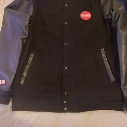 Here we have for sale a rarity now
Gents Original Coca Cola Brand Jacket
Size XL 
Wool and polyester materials 
In good condition 
only 10 pounds 
will deliver locally for free
or for collection 
will post at cost
check out my other great item 

Thank You