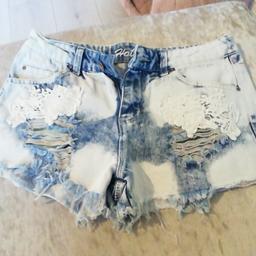 Ladies bleachwashed hot pant shorts, frayed edges, rips and patterned, size 10,COLLECTION ONLY.