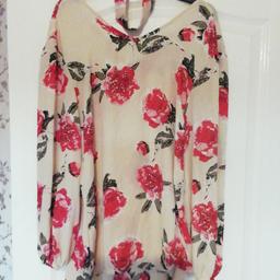 Ladies long sleeved blouse, beige with red flowers, will fit a size 12-14,16,has a neck choker to match,COLLECTION ONLY.