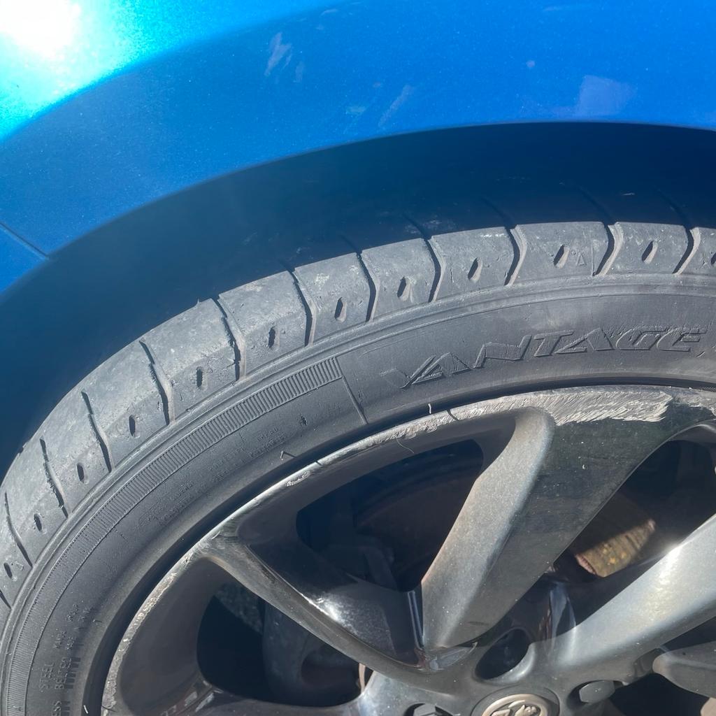 Exterior damage- Scratch on rims, scratch on back on car above left light(see in photo), scratch on side next to driver door. Not massive scratches but they are there