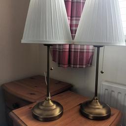 2 bedside lamps with cream shades in great condition

collection only