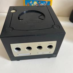 Nintendo game cube, console only, spares or repairs, turns on but can’t get no signal to TV