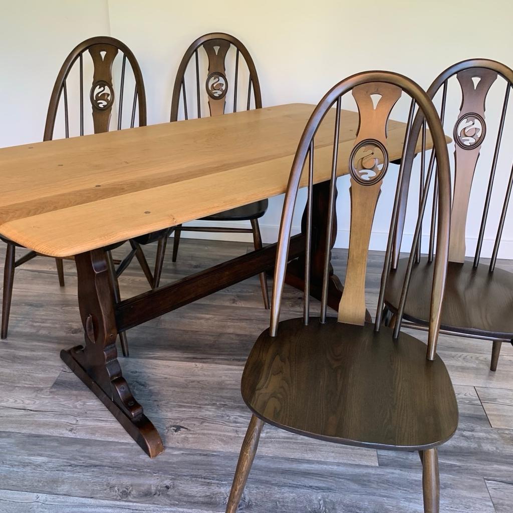 A stunning Ercol vintage refectory table (model 155) and 4 Ercol swan dining chairs (model 876).
The table top has been sanded back, waxed and oiled to enhance its natural grain. The base has been left untouched, and is in a super condition for its age.
The 4 chairs have not been touched they are in immaculate original condition, and go together to make a beautiful dining set.
A timeless classic to showcase in any home.
Viewings welcomed
Collection from smoke and pet free home.