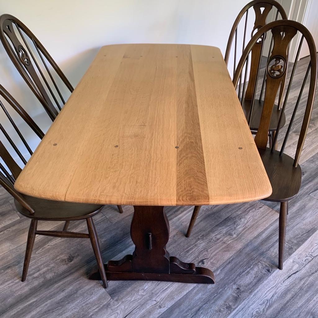 A stunning Ercol vintage refectory table (model 155) and 4 Ercol swan dining chairs (model 876).
The table top has been sanded back, waxed and oiled to enhance its natural grain. The base has been left untouched, and is in a super condition for its age.
The 4 chairs have not been touched they are in immaculate original condition, and go together to make a beautiful dining set.
A timeless classic to showcase in any home.
Viewings welcomed
Collection from smoke and pet free home.