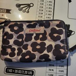 we have a lovely Cath Kidston purse for sale in excellent condition unused from smoke and pet free home collection only
