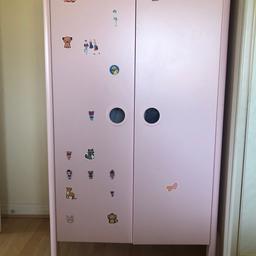 children’s pink ikea wardrobe, a couple of small marks on front which are not really noticeable and covered with stickers. H 140cm W 80cm D 52cm- cash on collection please
