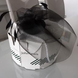 John Lewis black fascinator.Worn once for a wedding.In excellent condition with box.Can post for extra cost.