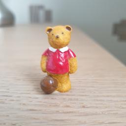 Bear playing football ornament

Approx height 3cm

Made in England

In good condition

From a pet and smoke-free household

Collected £1