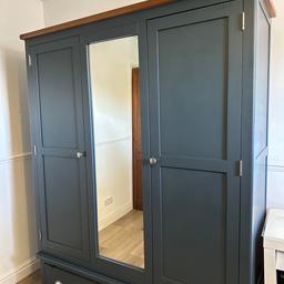 Double Door Wardrobe with Mirror and 2 Draws.
Blue.

1470mm length 
550mm width 
1900mm height

Few dents and marks but not massively noticeable, has had a clean since pictures were taken, it is dismantled but will need to be collected only. 

Open to offers! no time wasters ❌