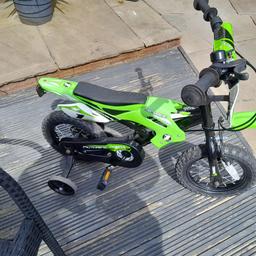 this is my grandsons bike excellent condition only used handful times cost 130 brand new no looks like a real motor bike but with pedals kids upto age 5 will love it ideal birthday or even Christmas prezzie