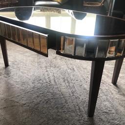 Laura Ashley antique style mirrored coffee table Good condition has two hidden drawers
Paid £550 just over three years ago Also have matching side table available as can be seen on photos selling for £60