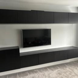 Ikea TV media and storage unit
Excellent condition
Dark brown/black
Glass top

3m length
Width 42cm
Height 39cm

Width 60cm
Depth - 42 cm
Larger end unit Height - 65cm

5 cupboards at the top and 4 cupboards plus 1 large cupboard at the bottom