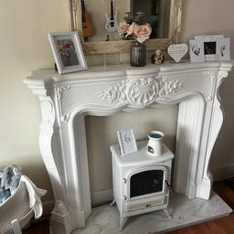 Fire place set 
Marble slat paid 250
Electric fire paid 150
Fire surround 100
Mirror 50

Just want £100 ONO for it all