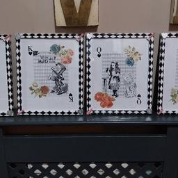4 beautiful handmade Alice frames in the style of playing cards. The frames are large 8 x 10, embellished including the frame whixh has been covered in clear vinyl for wear and tear.

Super unique.