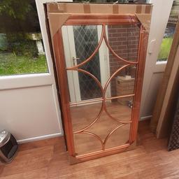 This is a beautiful copper wooden mirror brand new size is 50 inches by 28 inches.
contact number 07853 864726.