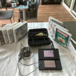 Nintendo DS lite ,black. With carrying case ,charging plug and 8 games. Buyer collect.