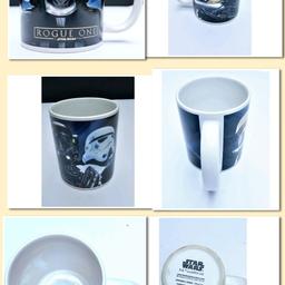 Star Wars Rouge One Star Wars Story Black Blue Mug
From Lucasfilm Ltd
10cm Tall 8cm wide 
Condition
PreOwned previously Used item but still great condition
On inspection see no cracks or chips.
No original box
