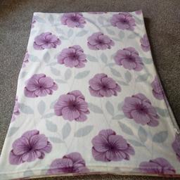 Large fleece blanket. About the size of a double quilt. Good clean condition just changing decor