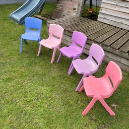 5 plastic garden chairs selling as bundle
1 light Purple
1 dark purple 
1 blue
1 Light pink
1 Dark pink
Stackable