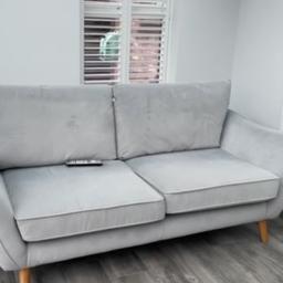Grey Sofa with cuddle chair and Stool in very good condition.