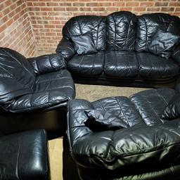 Black leather 3 seater and 2 seater sofas, armchair and footstool with storage in excellent condition from smoke and pet free home. Can deliver
